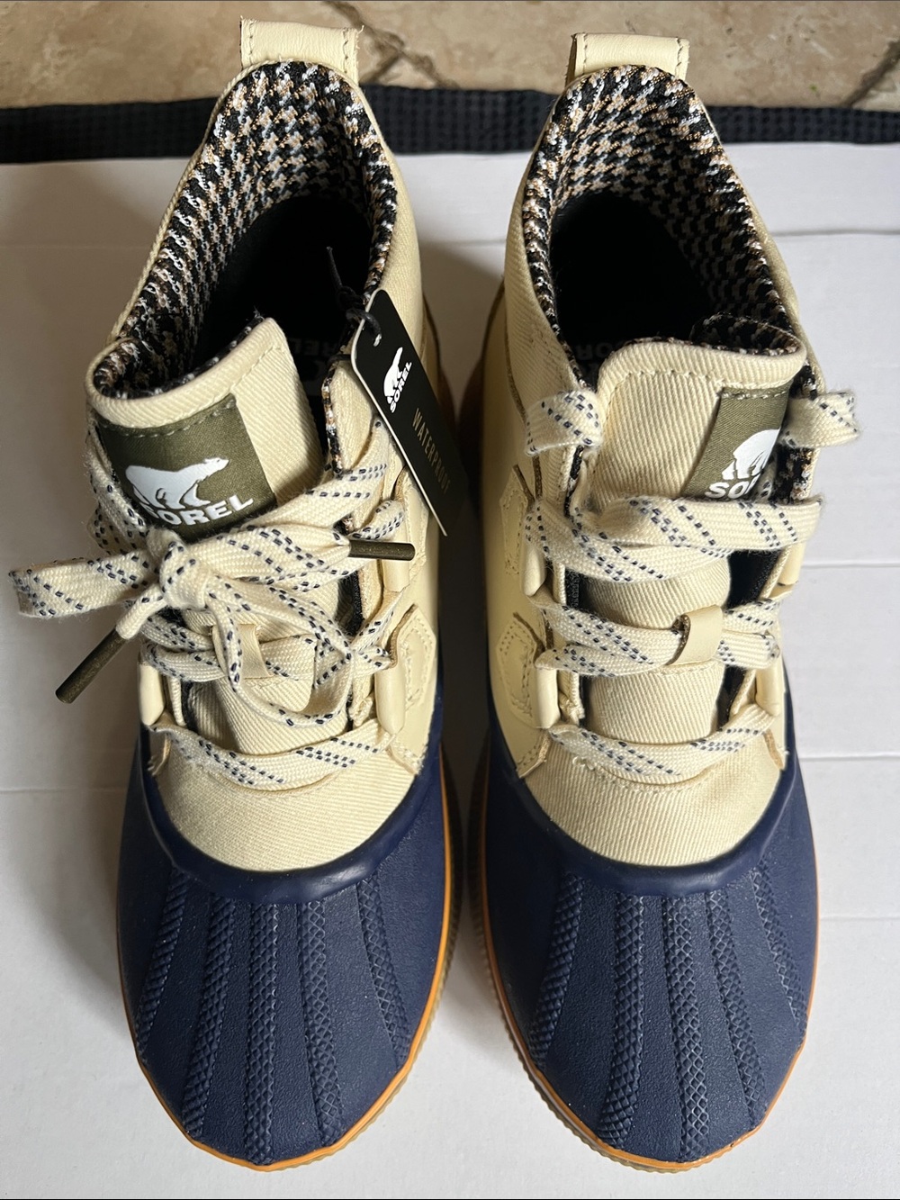 Sorel Duck Boots in Navy and Cream with Tan Trim